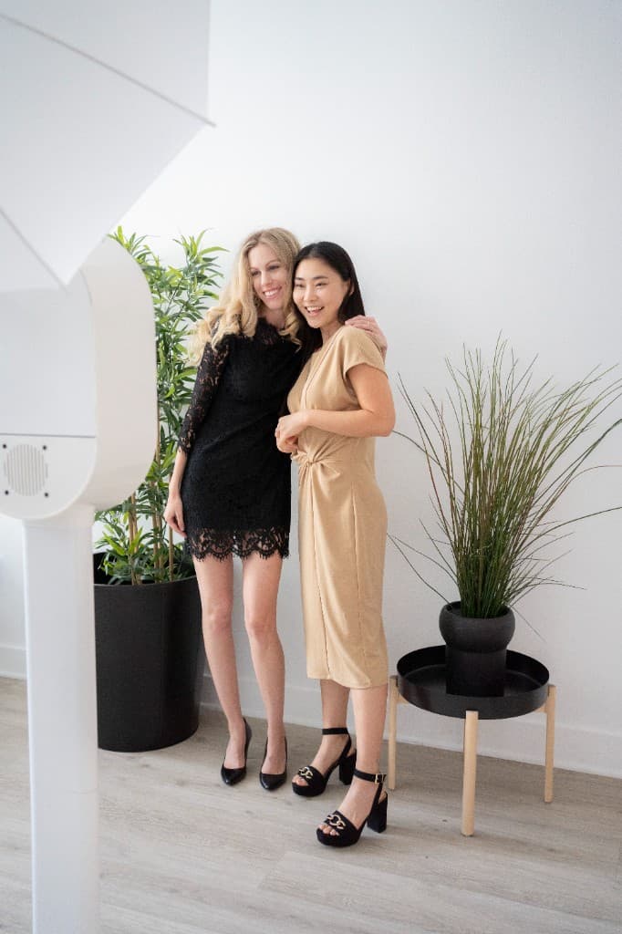 Guests posing at the booth